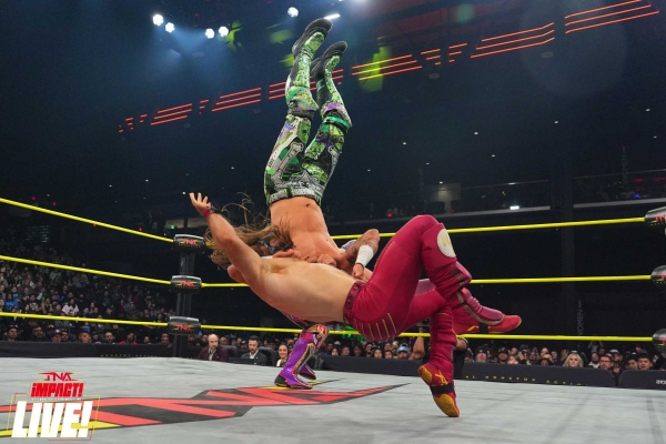 Click to view full size image
==============
TNAiMPACT2504_LIVE_TheRascalz_vs_Fraxiom_ArriannaGrace_WesLee-WM-41.jpg TNAiMPACT2504_LIVE_TheRascalz_vs_Fraxiom_ArriannaGrace_WesLee-WM-41.jpg